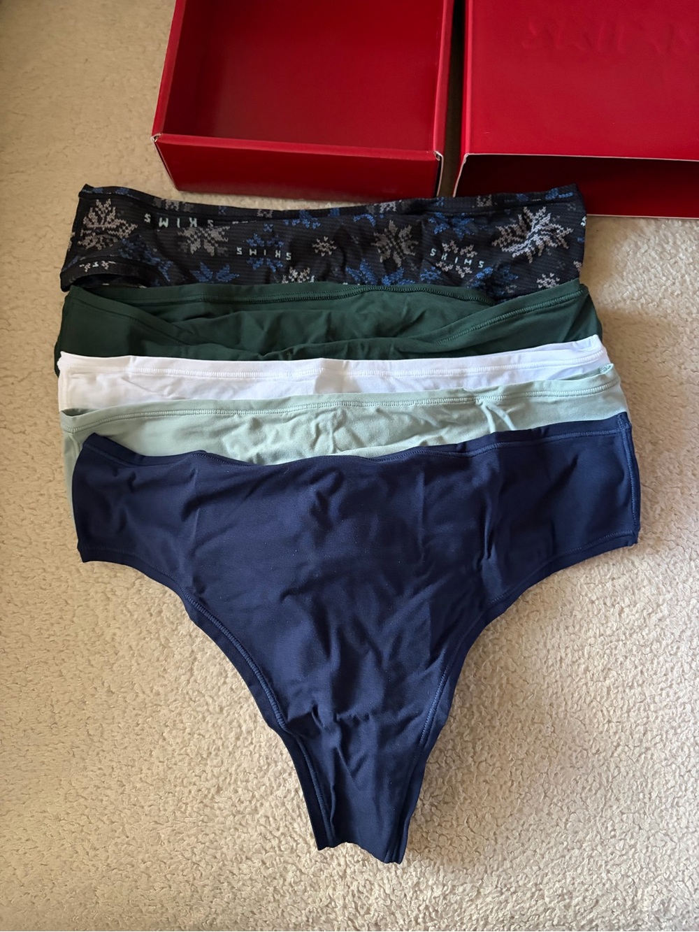 SKIMS Women's Thong Pack in Navy, Green, White, Light Blue, Black Pattern